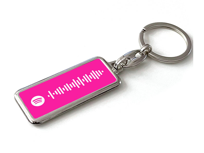 Gepersonaliseerde roze Spotify sleutelhanger met jouw favoriete songcode. Uniek cadeau voor muziekliefhebbers of als stijlvol accessoire.